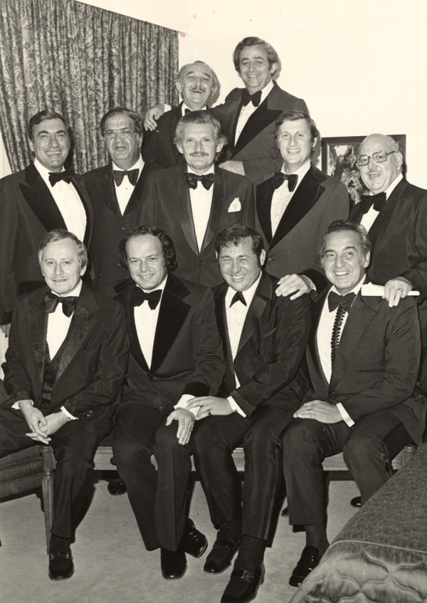 Group of men in formal dress, including Morris Wosk top row, left, at a State of Israel Bonds event, Vancouver, B.C., 1976.